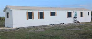 7739 NW County Road 1200 - Photo 1